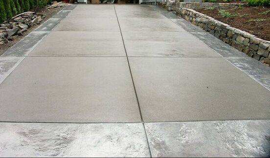 A Concrete Driveway with stamped edges