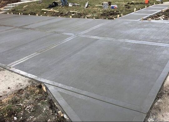A concrete driveway that just was finished 