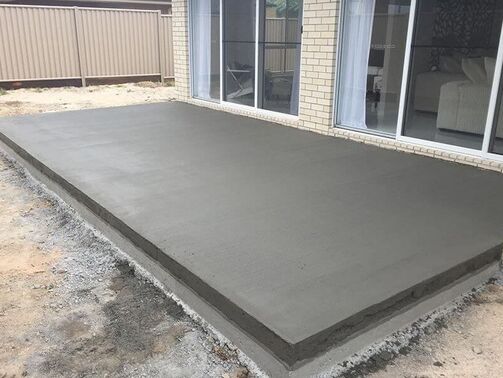 Freshly poured back patio concrete 